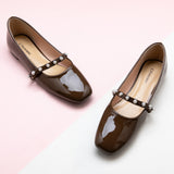 Sweet Indulgence: Chocolate Mary Jane with a single stripe and pearl, a deliciously stylish addition to your footwear collection.
