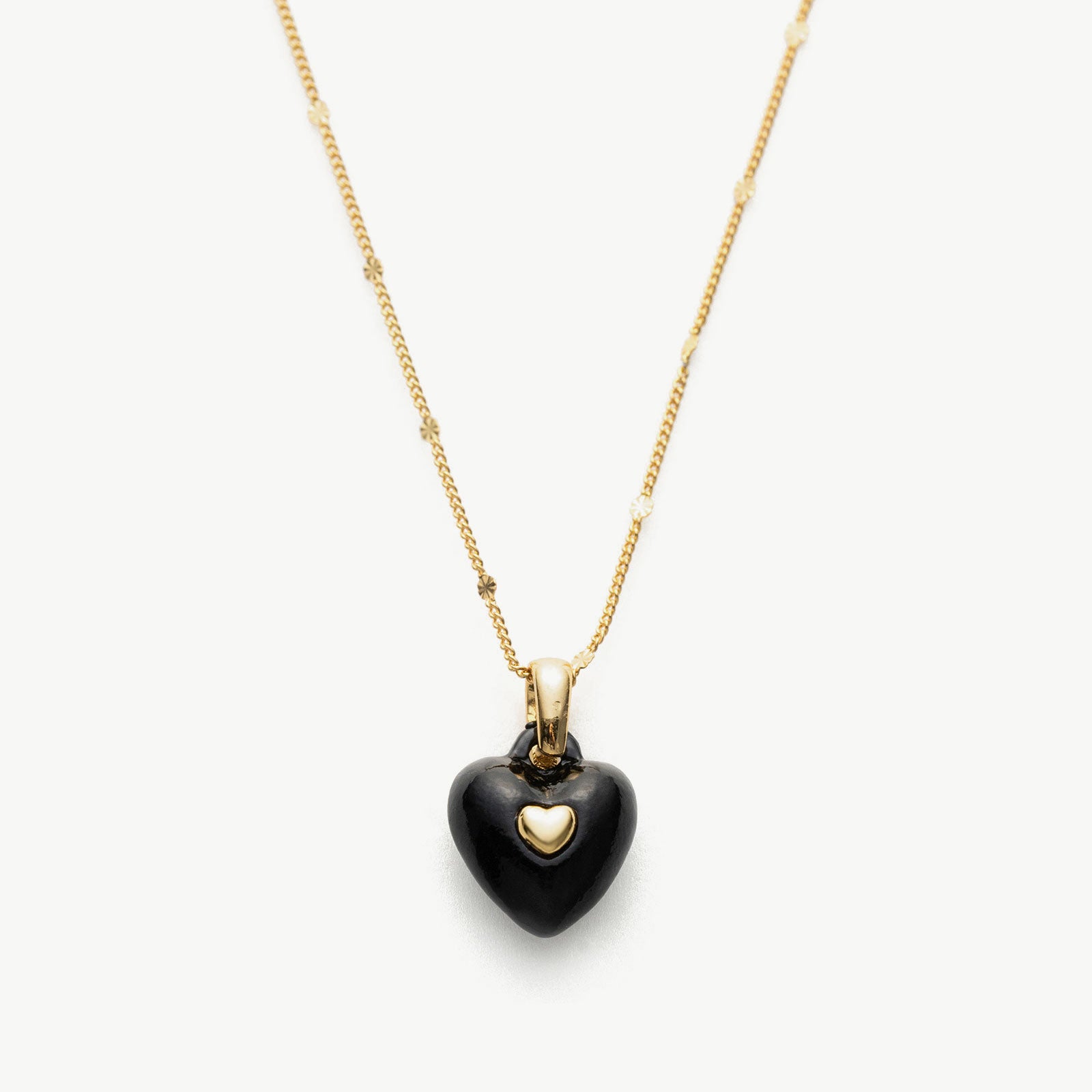 Onyx Heart Pendant Necklace, a timeless piece featuring a heart-shaped onyx pendant in classic black, adding a touch of elegance and sophistication to your necklin