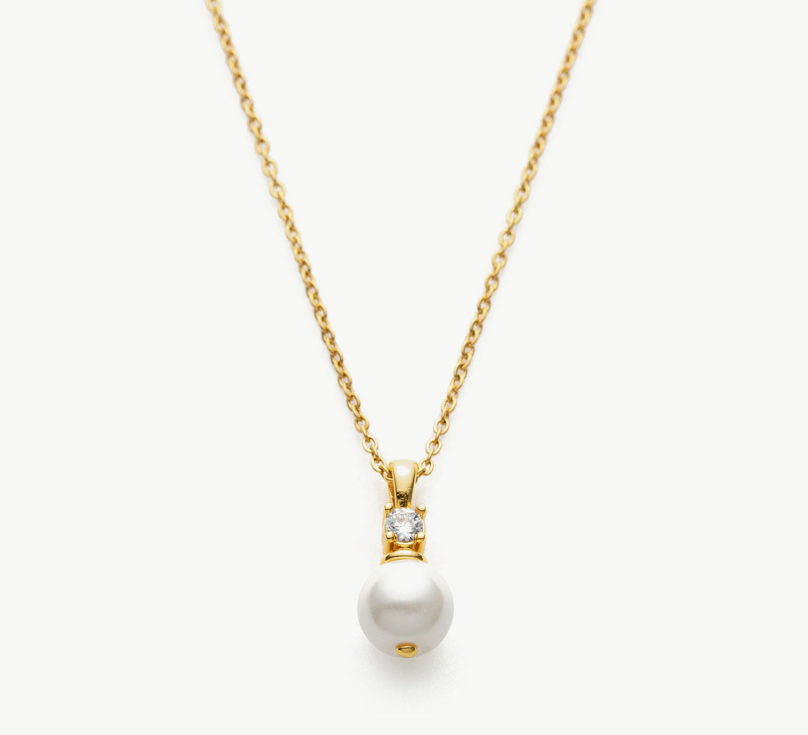 Pearl Drop Pendant Necklace in Gold, showcasing a timeless gold pendant with a lustrous pearl, adding a touch of elegance and sophistication to your neckline.