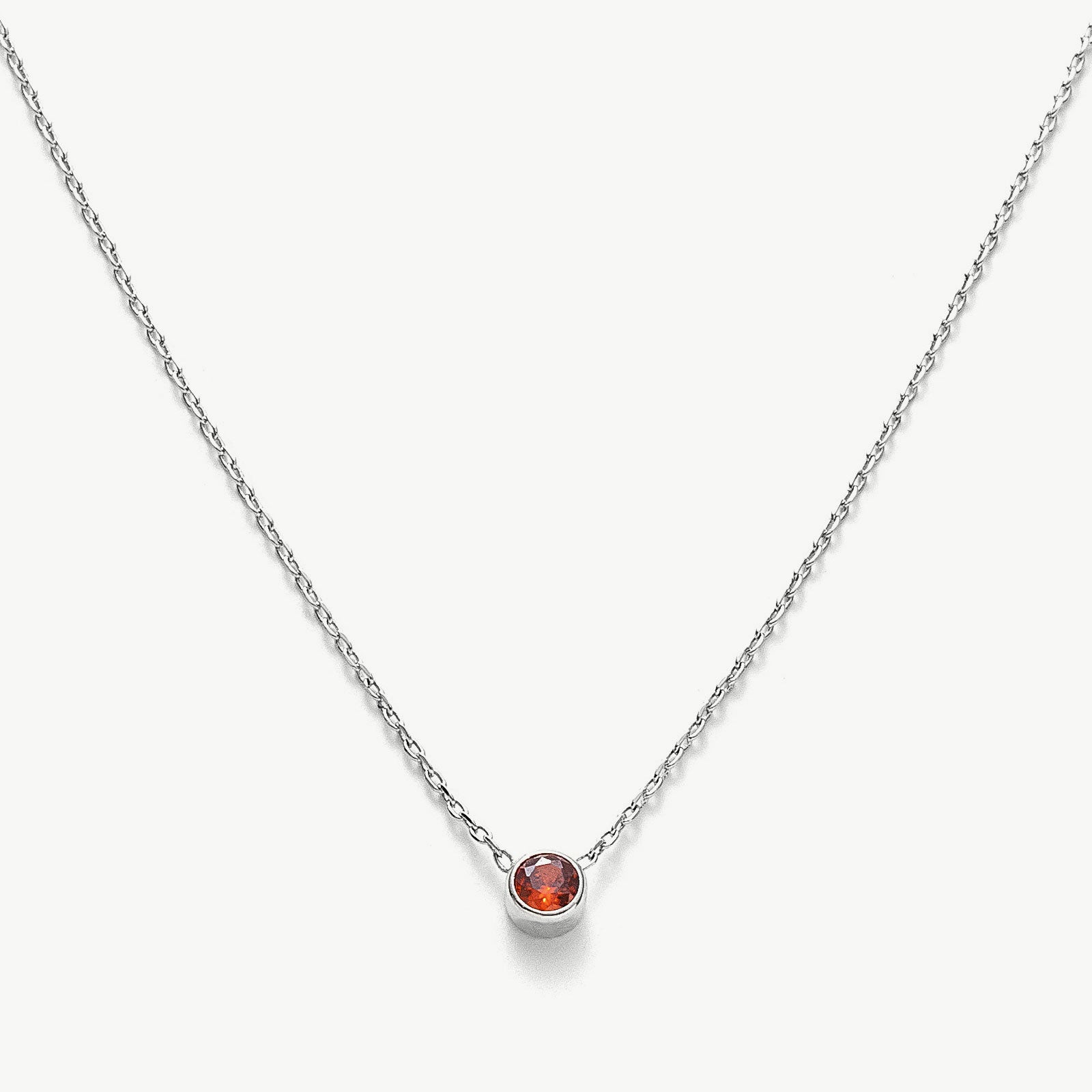 Platinum Ruby Crystal Pendant Necklace, radiating eternal ruby radiance, this necklace features a captivating crystal pendant suspended from a delicate platinum chain, expressing enduring style and grace