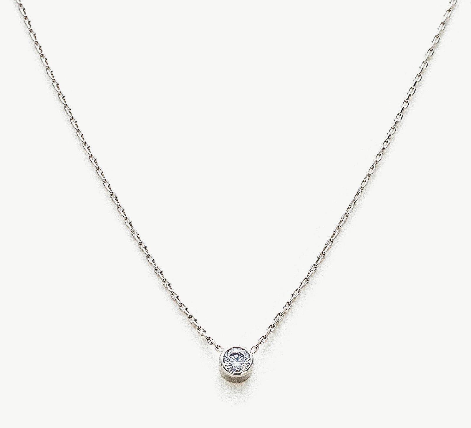 Platinum Crystal Pendant Necklace, unveiling the grace of platinum, this necklace features a mesmerizing crystal pendant in a rich platinum hue, creating a captivating and versatile accessory