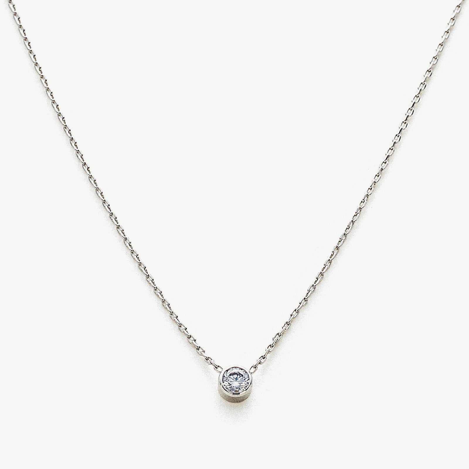 Platinum Crystal Pendant Necklace, unveiling the grace of platinum, this necklace features a mesmerizing crystal pendant in a rich platinum hue, creating a captivating and versatile accessory