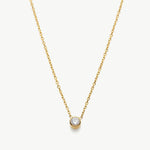  Crystal Pendant Necklace in Gold, showcasing a timeless gold pendant that adds a touch of elegance and sophistication to your neckline