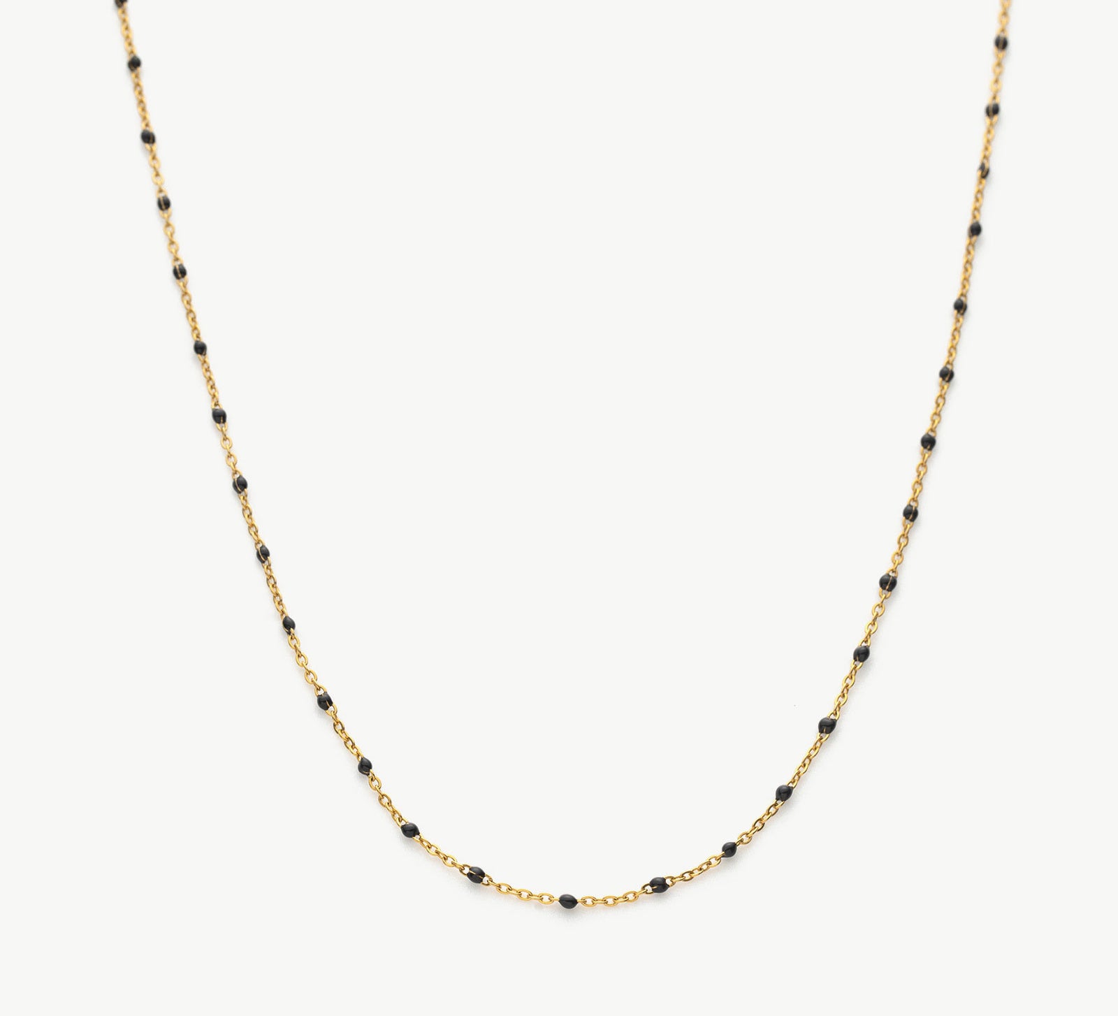 Beads Chain Necklace, a bohemian-inspired piece featuring a chain adorned with an array of colorful beads, creating a harmonious and laid-back accessory for a touch of eclectic style