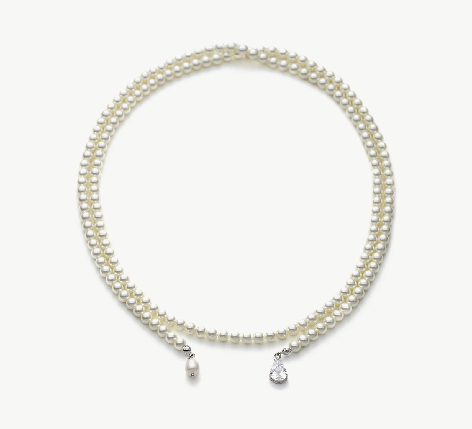 Long Pearl Necklace, an effortlessly elegant piece featuring a strand of lustrous pearls that delicately drape for a timeless and sophisticated look, perfect for adding a touch of class to any outfit.
