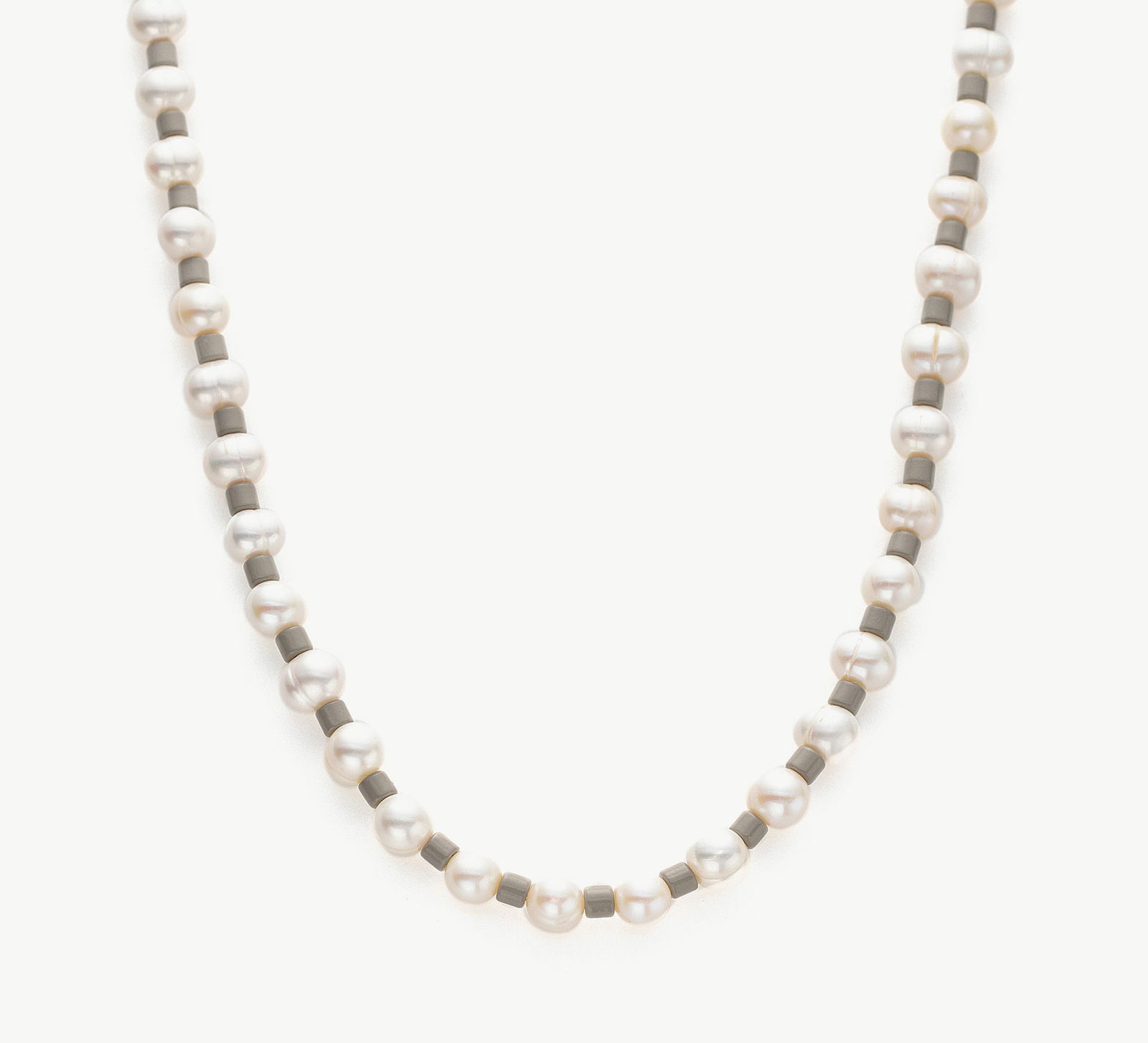 Pearl Beaded Necklace, radiating eternal pearl radiance, this necklace showcases a timeless strand of pearls, expressing enduring style and grace