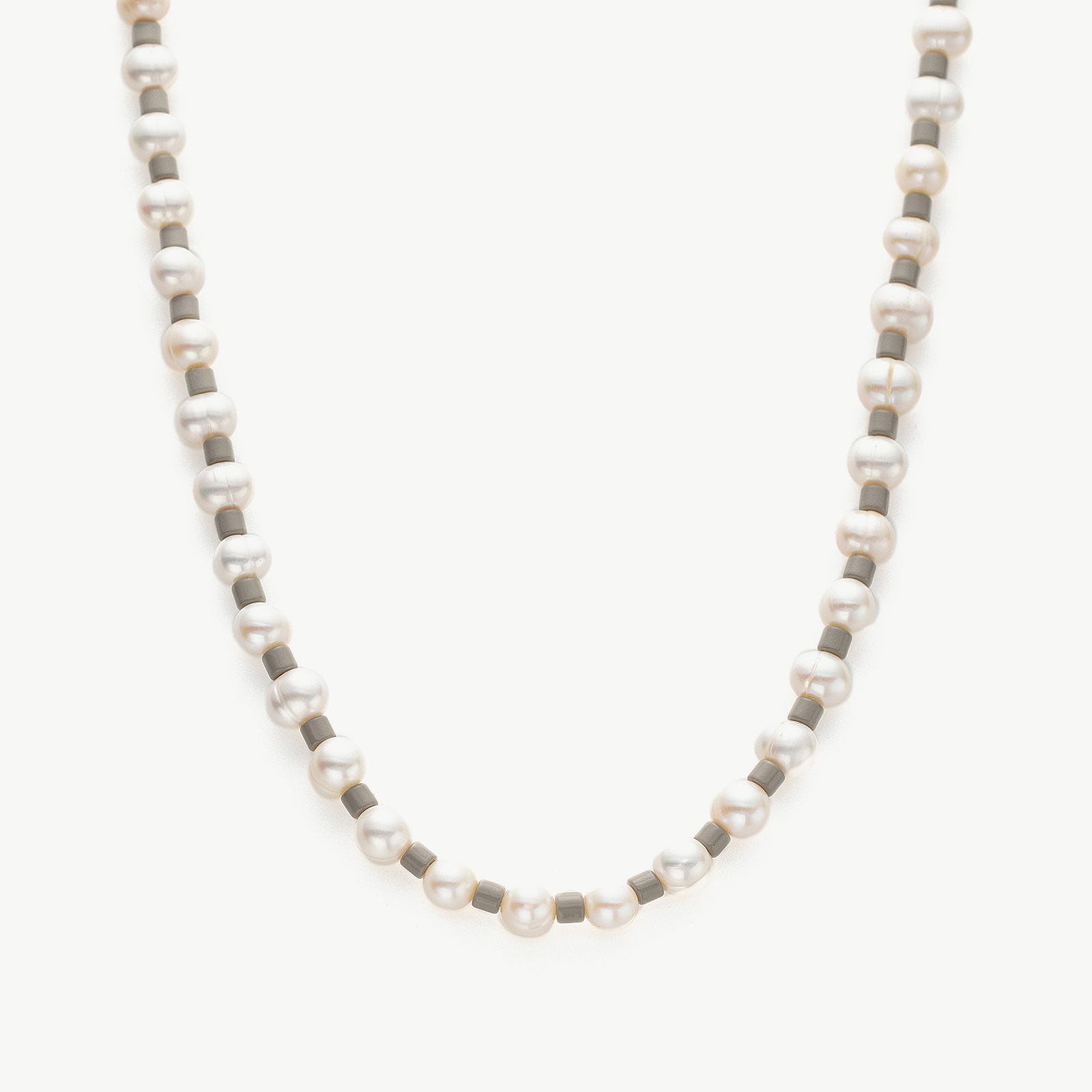 Pearl Beaded Necklace, radiating eternal pearl radiance, this necklace showcases a timeless strand of pearls, expressing enduring style and grace