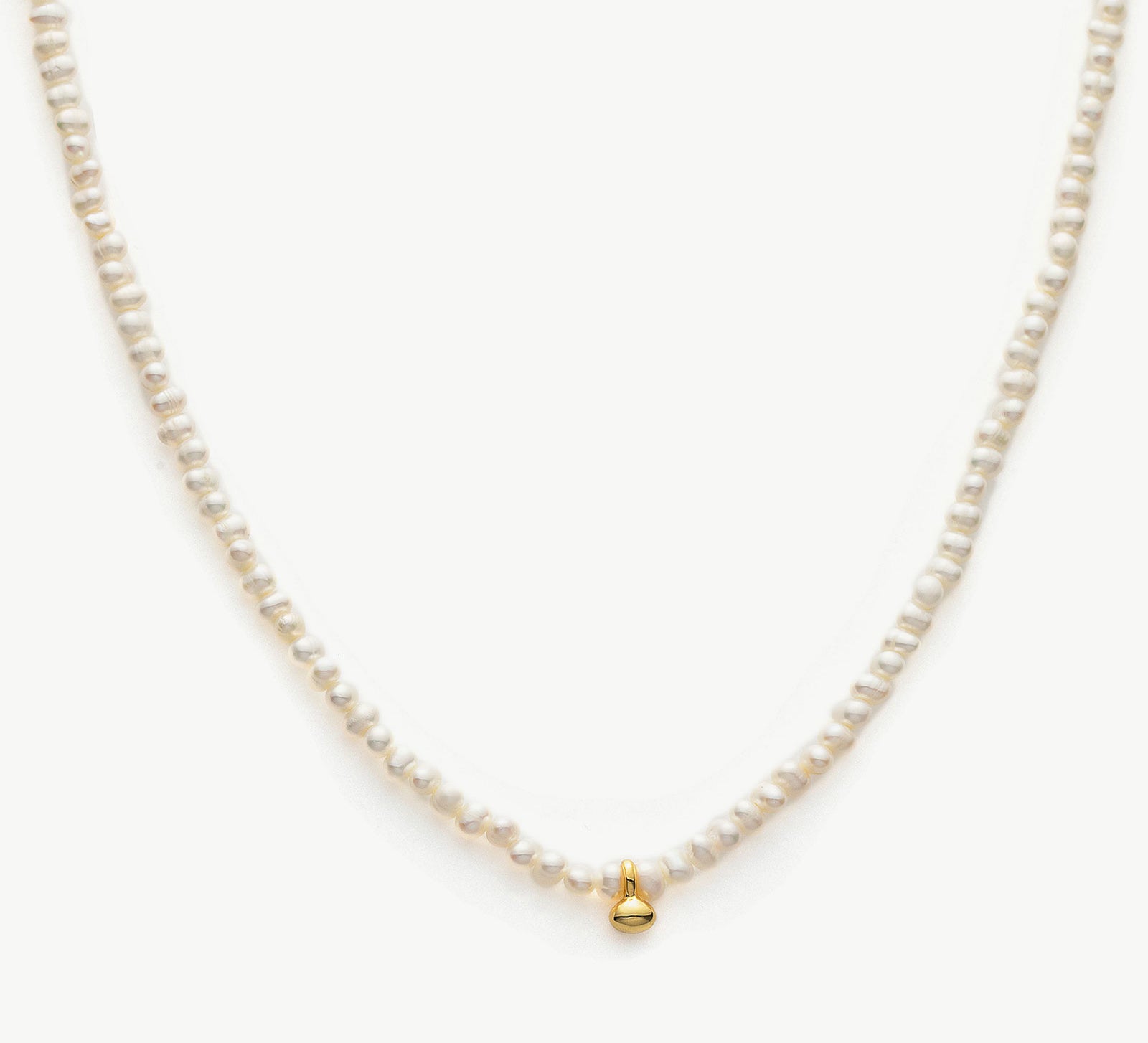 Pearl Gold Pendant Choker, a symbol of timeless elegance, this choker features a lustrous pearl pendant suspended from a delicate gold chain, creating a classic and sophisticated accessory for any occasion