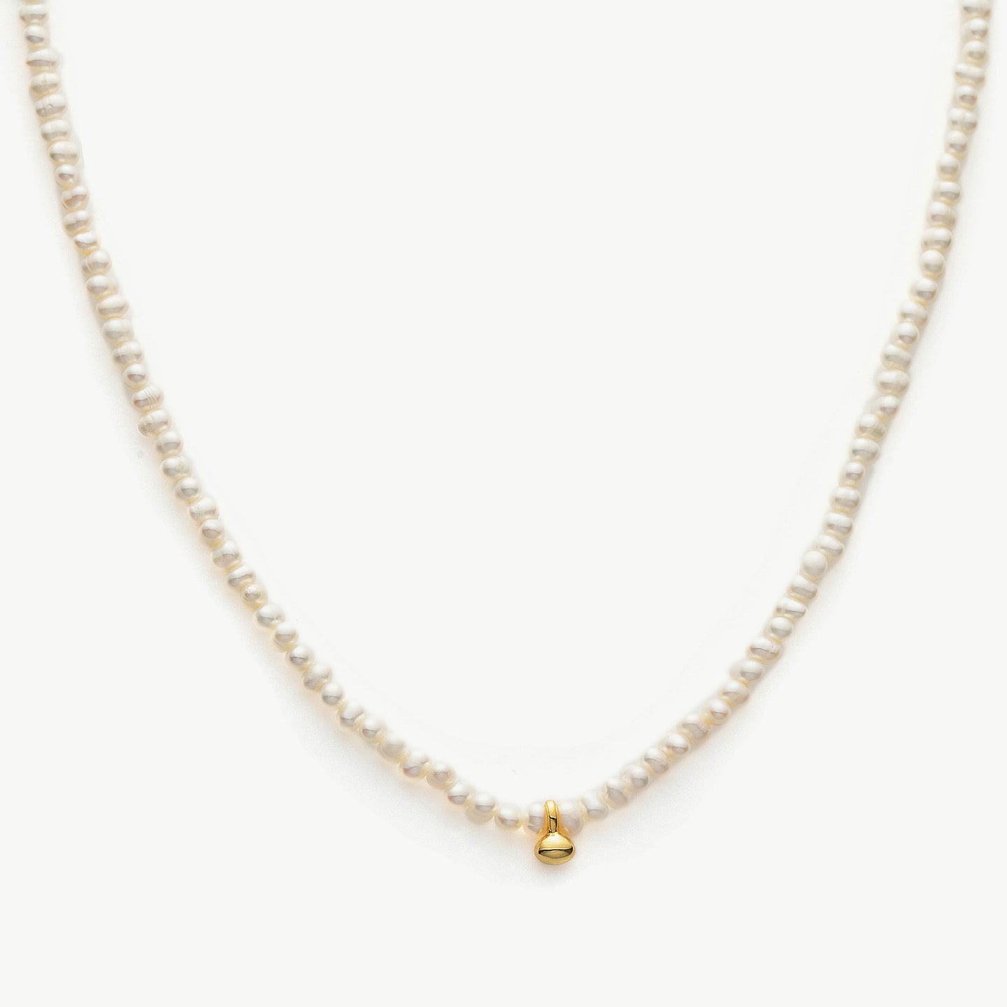 Pearl Gold Pendant Choker, a symbol of timeless elegance, this choker features a lustrous pearl pendant suspended from a delicate gold chain, creating a classic and sophisticated accessory for any occasion