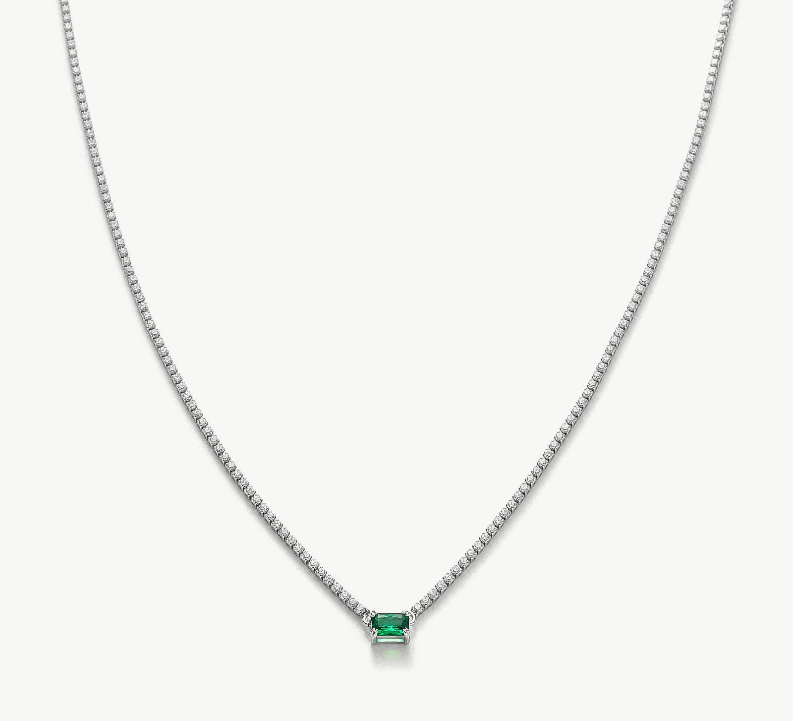 Emerald Rectangle Dewdrop Pendant, a regal and elegant accessory featuring a captivating emerald rectangle dewdrop pendant, adding a touch of sophistication and allure to your neckline