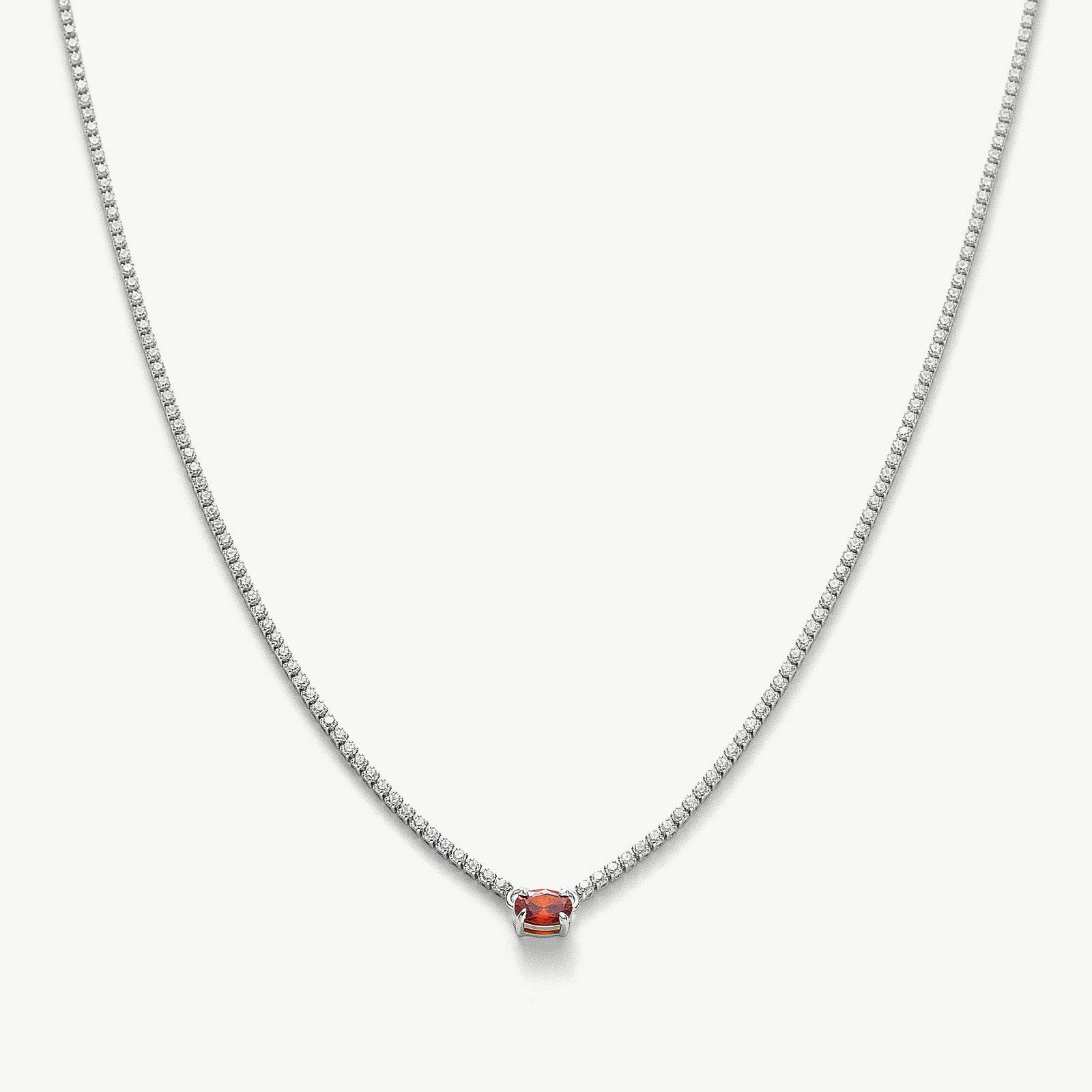 Regal Emerald Elegance: Emerald Rectangle Dewdrop Pendant, a regal and elegant accessory featuring a captivating emerald rectangle dewdrop pendant, adding a touch of sophistication and allure to your neckline