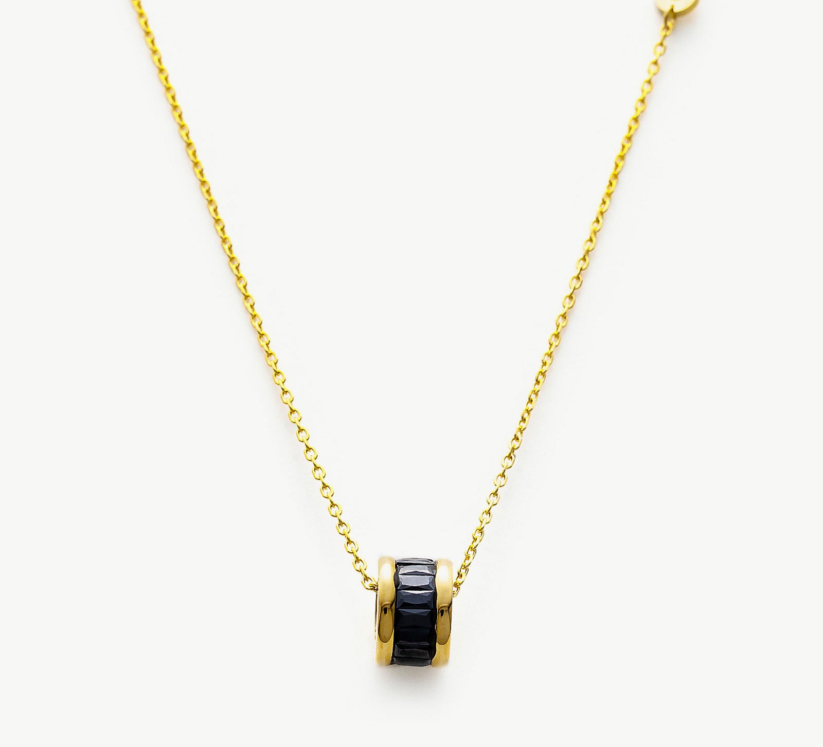  Black Ring Pendant Chain Necklace, a chic and versatile piece with a bold contrast, featuring a black ring pendant suspended from a delicate chain, adding a touch of modern sophistication to your neckline