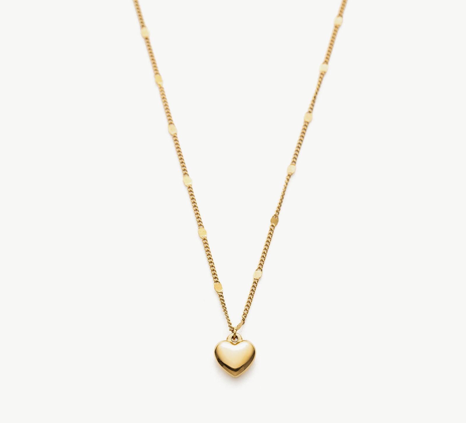 Heart Pendant Necklace in Gold, a timeless piece showcasing a heart-shaped pendant in radiant gold, adding a touch of elegance and sophistication to your neckline