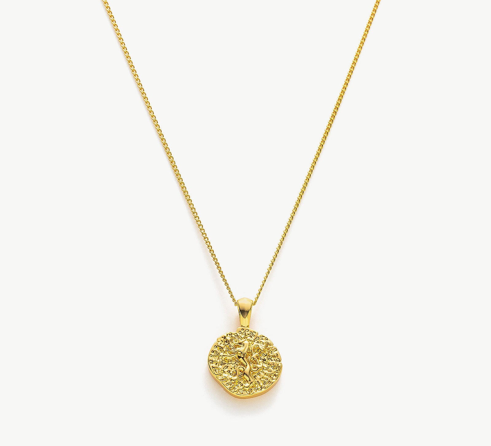 Gold Hammered Disc Pendant Necklace, a symbol of artisanal elegance, featuring a handcrafted gold hammered disc pendant on a delicate chain, adding a touch of handmade charm and sophistication to your neckline