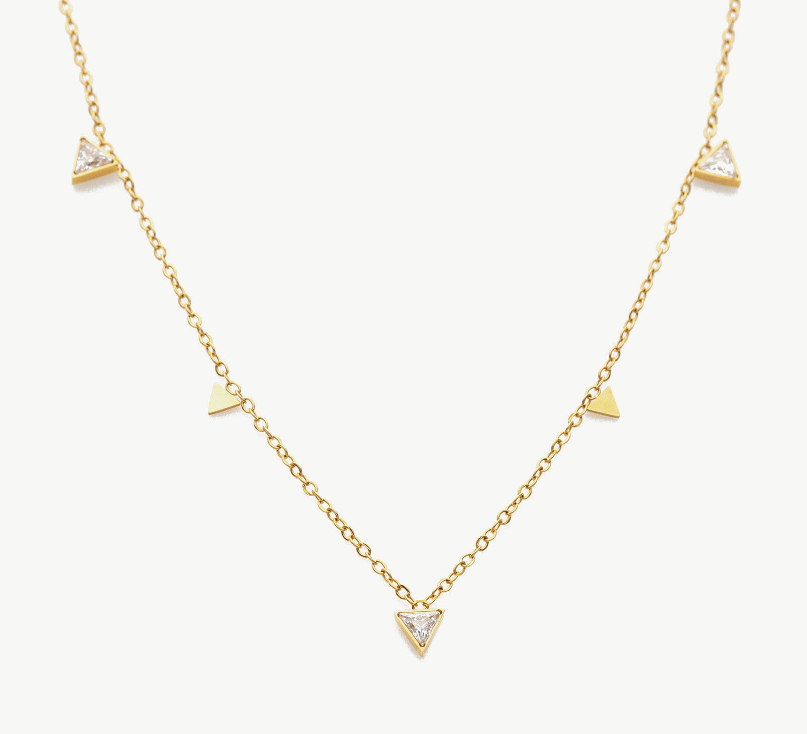 Diamond Drop Necklace, a stunning piece featuring a delicate chain with a radiant diamond drop pendant, adding a touch of elegance and sophistication to your neckline.