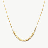  Pearl Chain Necklace, a timeless piece featuring a delicate chain adorned with lustrous pearls, adding a touch of elegance and sophistication to your neckline