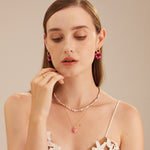  Onyx Heart Pendant Necklace, a timeless piece featuring a heart-shaped onyx pendant in soft pink, adding a touch of elegance and sophistication to your neckline