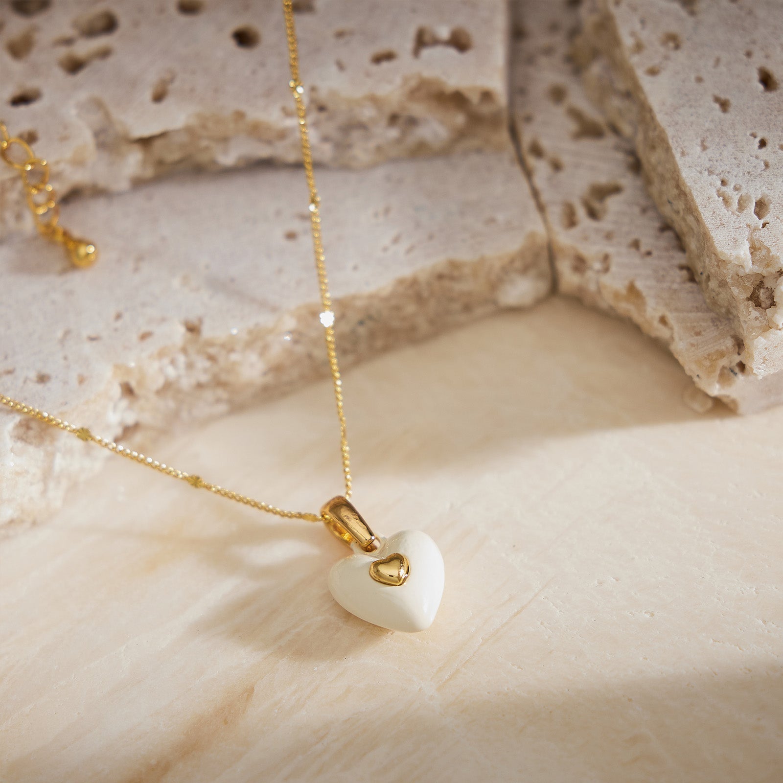 Luxurious White Sparkle: White Onyx Heart Pendant Necklace, exuding luxurious white sparkle, this necklace features a dazzling heart-shaped onyx pendant for a glamorous and captivating look