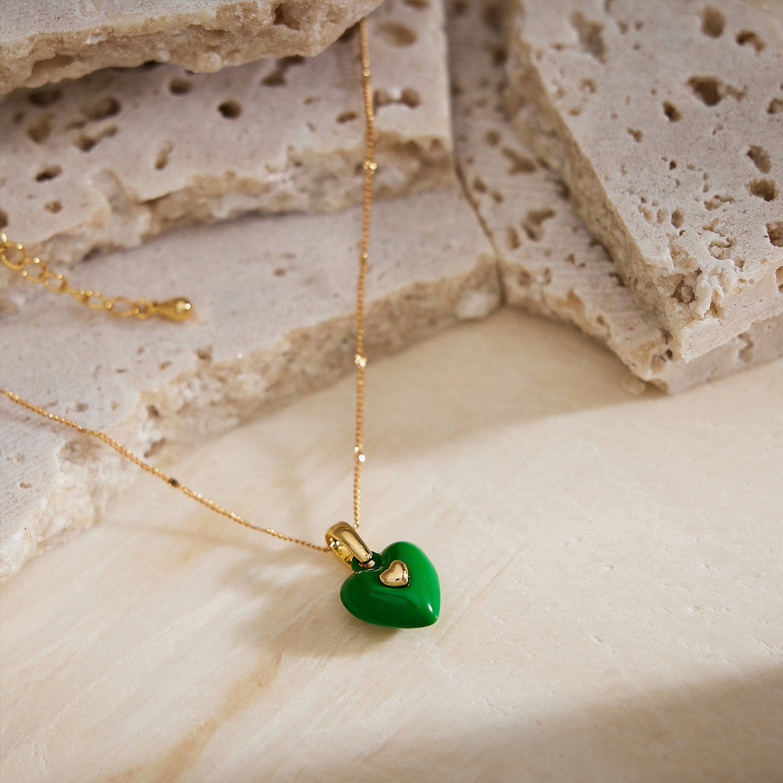 Green Grace Unveiled: Onyx Heart Pendant Necklace, unveiling the grace of green, this necklace features a mesmerizing heart-shaped onyx pendant, creating a captivating and versatile accessory