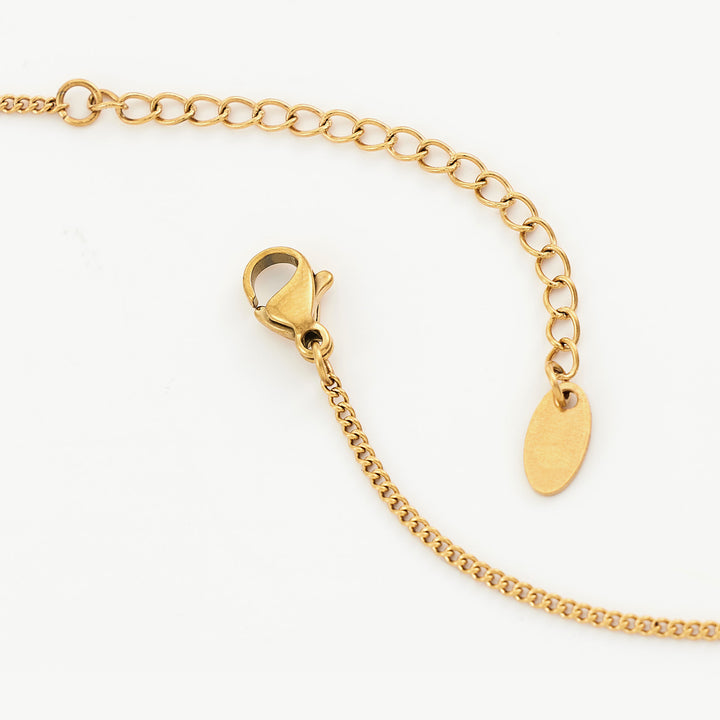 Gold Pearl Drop Pendant Necklace, exuding luxurious gold sparkle, this necklace features a dazzling pearl drop pendant in a shimmering gold shade