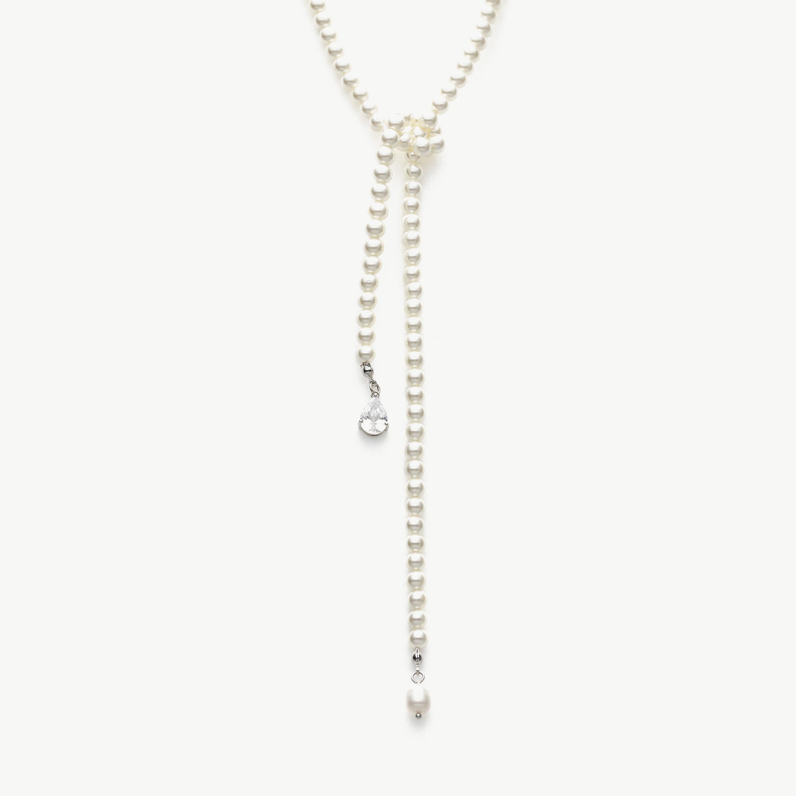 Long Pearl Necklace, a chic and versatile accessory that can be worn in different styles, whether layered or as a single strand, offering a touch of timeless beauty to your ensemble