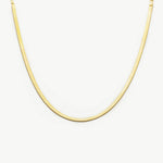 Snake Chain Necklace, a sleek and modern piece featuring a serpent-like chain that effortlessly wraps around your neckline, adding a touch of contemporary elegance to your look