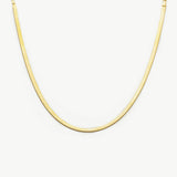 Snake Chain Necklace, a sleek and modern piece featuring a serpent-like chain that effortlessly wraps around your neckline, adding a touch of contemporary elegance to your look