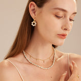 Pearl Beaded Necklace, a radiant pearl charm captured in a string of delicate beads, creating a stylish and timeless accessory to elevate your ensemble