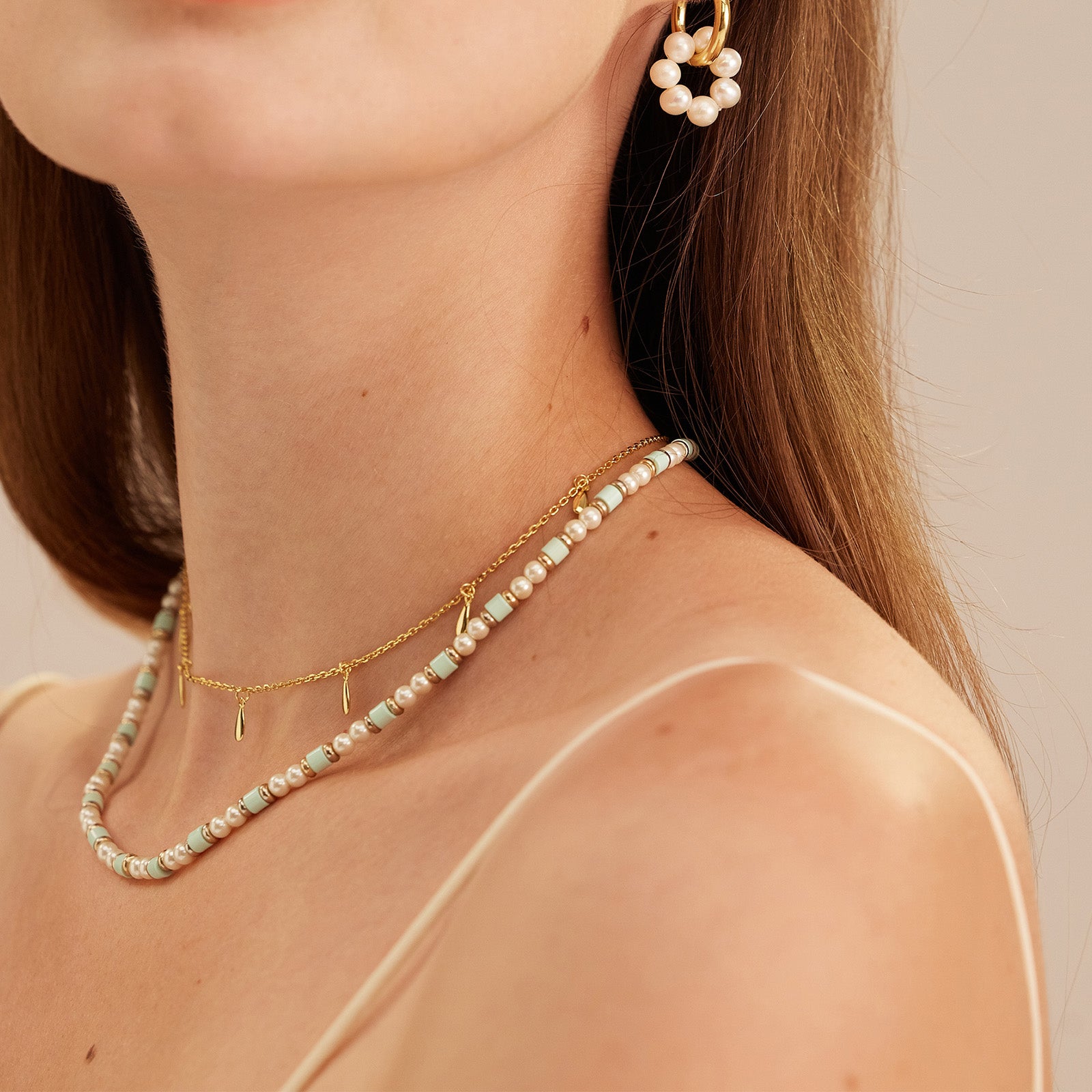  Pearl Beaded Necklace, exuding luxurious pearl sparkle, this necklace features a strand of dazzling pearls for a glamorous and captivating look.
