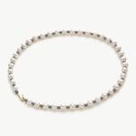 Chic Pearl Accent: Pearl Beaded Necklace, a chic pearl accent that enhances your style, featuring a stylish strand of classic pearls for a versatile and fashionable statement