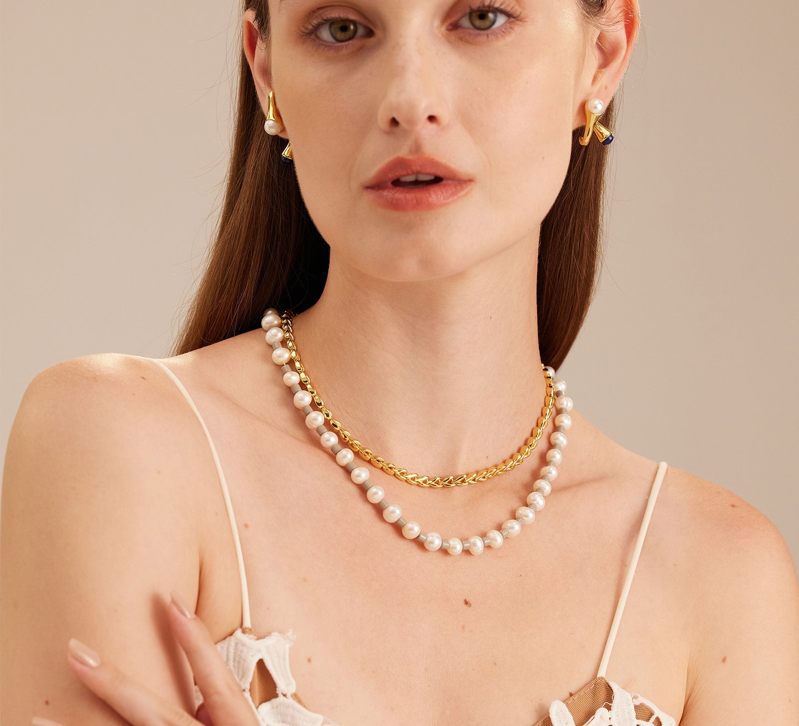 Pearl Beaded Necklace, unveiling the grace of pearls, this necklace features a mesmerizing strand of lustrous pearls, creating a captivating and versatile accessory.