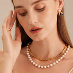 Luxurious Pearl Sparkle: Pearl Beaded Necklace, exuding luxurious pearl sparkle, this necklace features a strand of dazzling pearls for a glamorous and captivating look