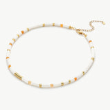 Beaded Stack Necklace, a harmonious combination of beads in different shapes and sizes, creating an eclectic and eye-catching accessory that adds personality to your style