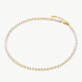 Gold Stone Beaded Necklace, symbolizing opulent beauty, this necklace showcases the richness of gold and the timeless allure of stones, creating a sophisticated and versatile accessory.