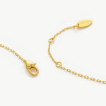 Gold Emerald Crystal Pendant Necklace, radiating eternal emerald radiance, this necklace features a captivating crystal pendant suspended from a delicate gold chain, expressing enduring style and grace