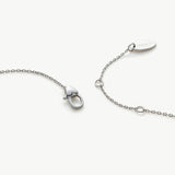Crystal Pendant Necklace in Platinum, radiating eternal platinum radiance, this necklace features a captivating crystal pendant suspended from a delicate platinum chain, expressing enduring style and grace