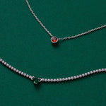 Platinum Ruby Crystal Pendant Necklace, showcasing a rich red crystal pendant on a delicate platinum chain, adding a touch of elegance to your style