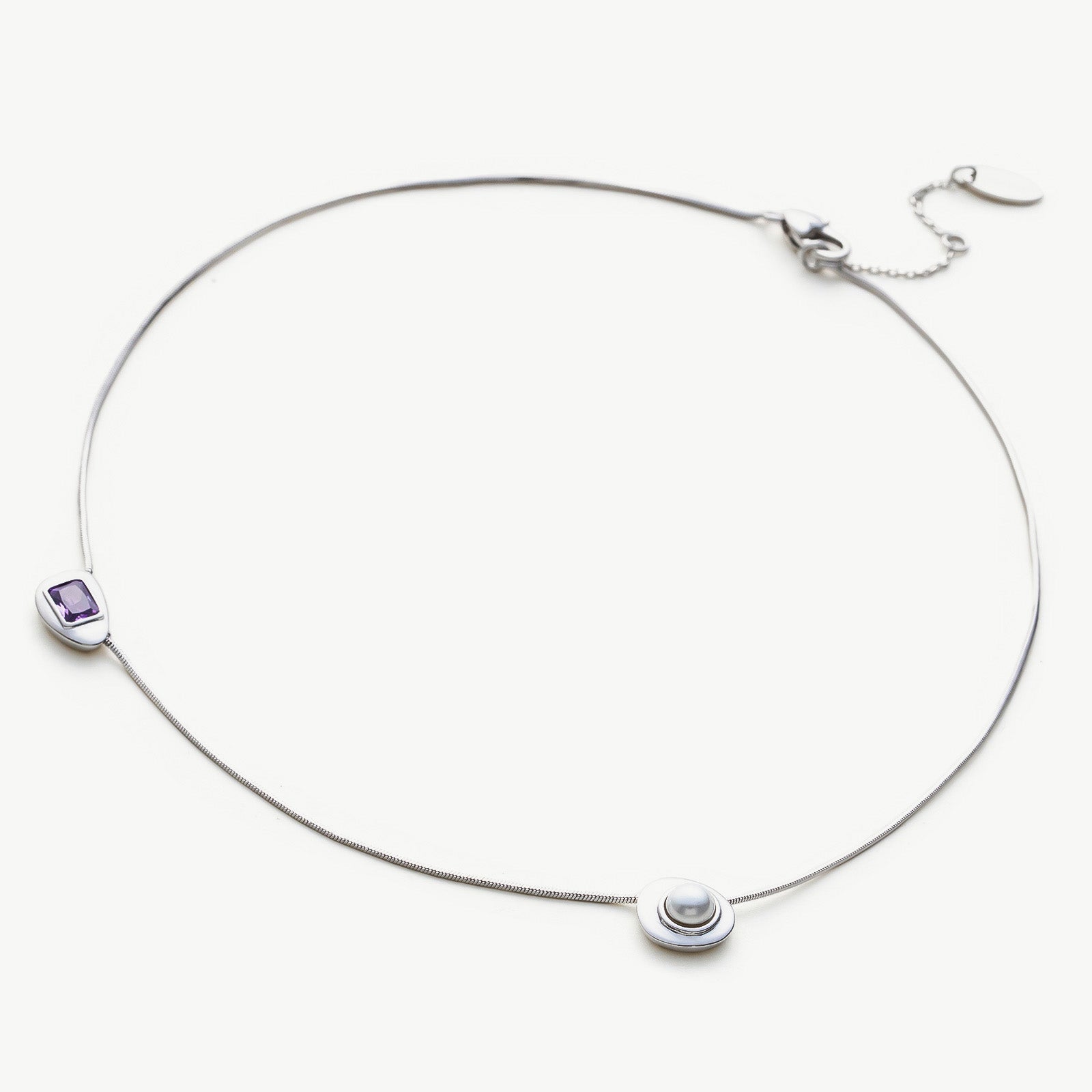 Platinum Sapphire Crystal Drop Pendant Necklace, making a deep blue statement, this necklace features a stunning sapphire crystal drop on a delicate platinum chain, adding a pop of color and modernity to your look