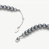 Dove Grey Water Pearl Necklace, a subtle and beautiful arrangement of grey water pearls, offering a refined and sophisticated look that effortlessly elevates your style.
