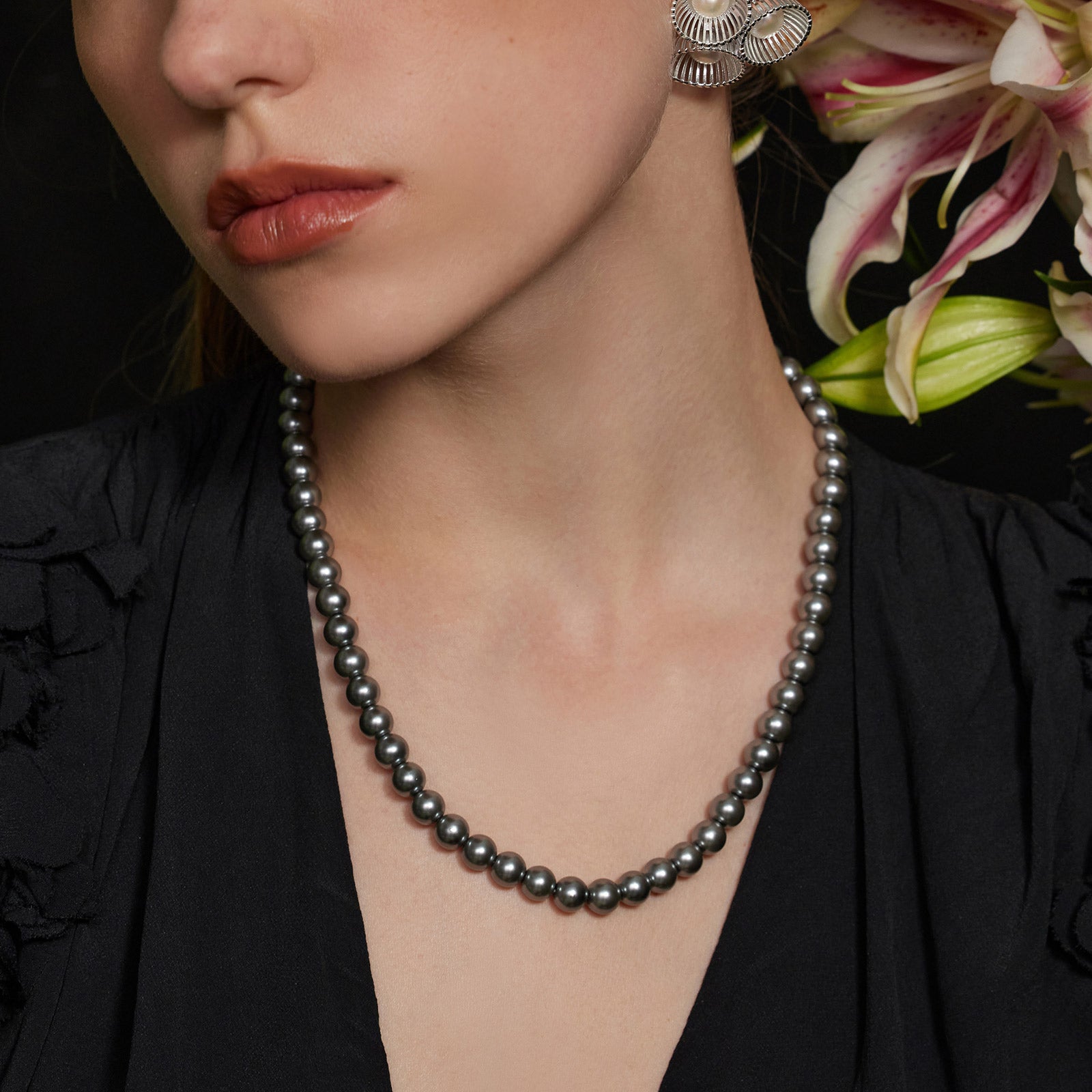 Dove Grey Water Pearl Necklace, exuding graceful radiance, this necklace showcases a strand of water pearls in a delicate dove grey shade, adding a touch of refinement to your neckline