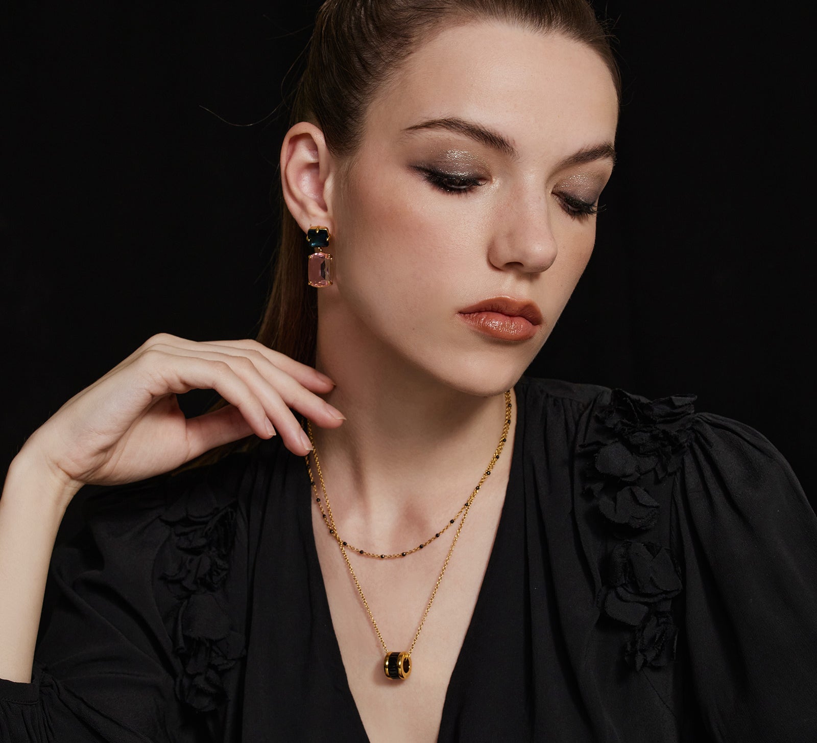 Black Ring Pendant Necklace, exuding edgy elegance, this necklace showcases a sleek black ring pendant on a delicate chain, making it a stylish and contemporary accessory for any occasion.