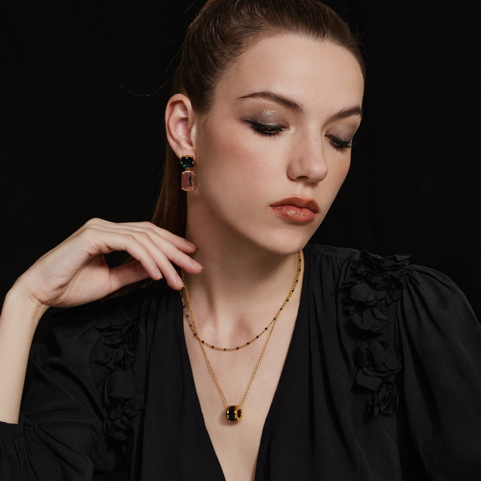 Black Ring Pendant Necklace, exuding edgy elegance, this necklace showcases a sleek black ring pendant on a delicate chain, making it a stylish and contemporary accessory for any occasion.
