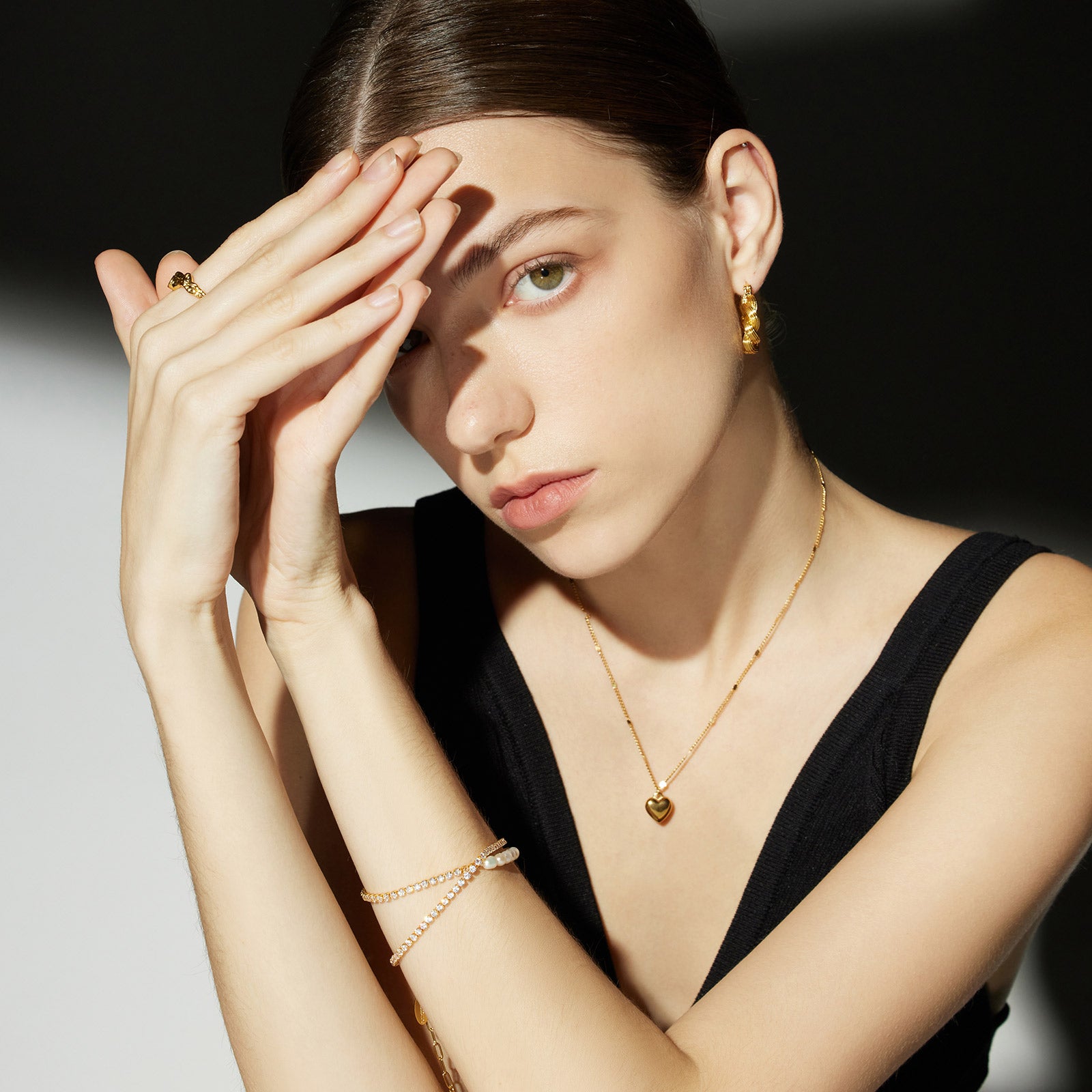 Heart Pendant Necklace with Platinum, a radiant platinum charm captured in a heart-shaped pendant, creating a stylish and timeless accessory to elevate your ensemble.