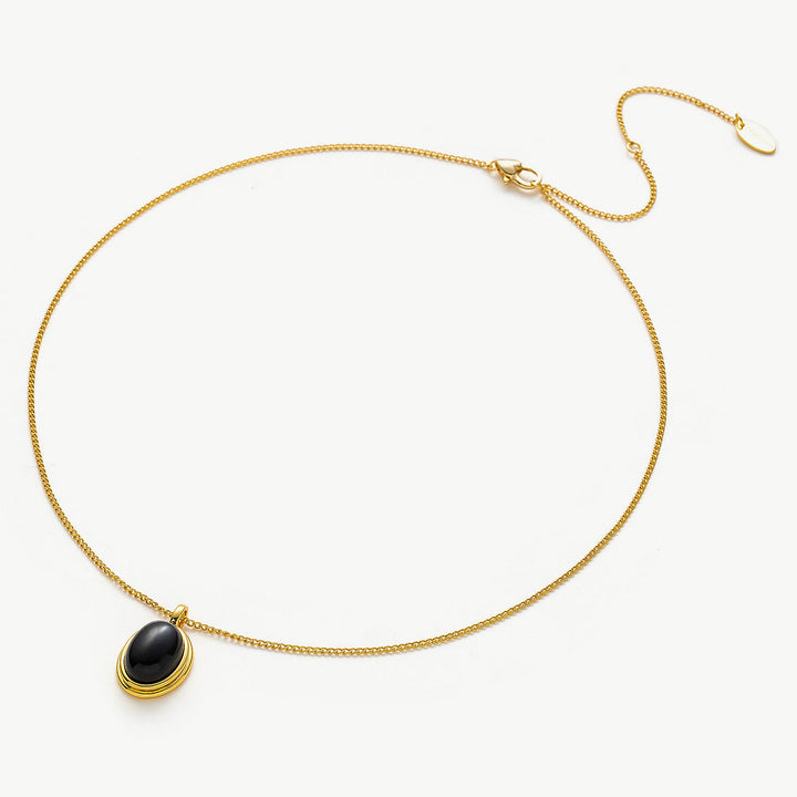 Gold Black Agate Pendant Necklace, a striking piece with bold contrast, this necklace features a gold chain adorned with a dramatic black agate pendant, adding a touch of sophistication and edge to your ensemble