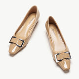 Pair of beige low-heels closed-toe shoes