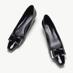 Pair of black low heels closed toe shoes