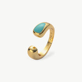 avi Sculptural Onyx Open Ring in blue, a graceful and stylish accessory that captures the allure of sapphire hues