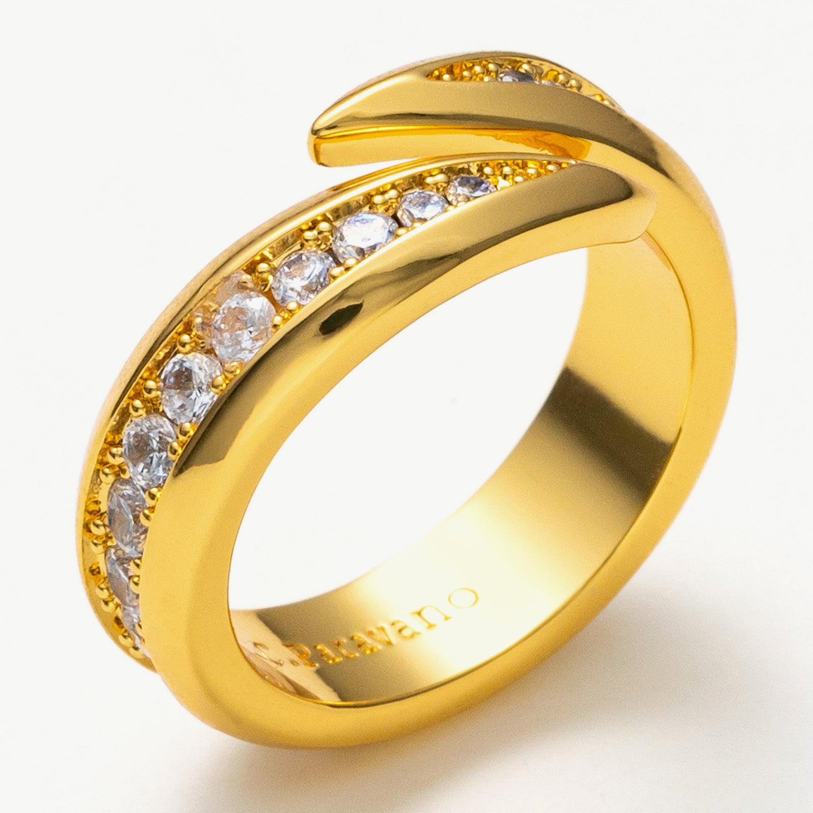 Crystal Crossover Ring in Gold, a glamorous and versatile piece that effortlessly elevates your style