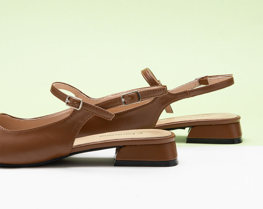 Sleek Brown Slingback Flats: Step out in style with these elegant brown slingback shoes adorned with a modern color block motif.