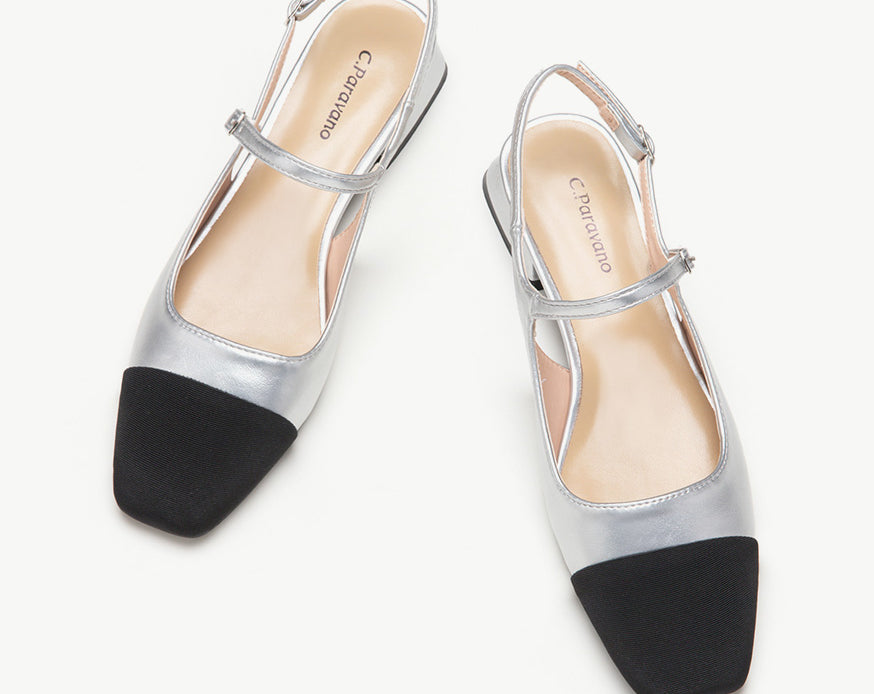 Silver Color Block Slingback Flats: A stylish pair of silver slingback flats with a contemporary color block desig